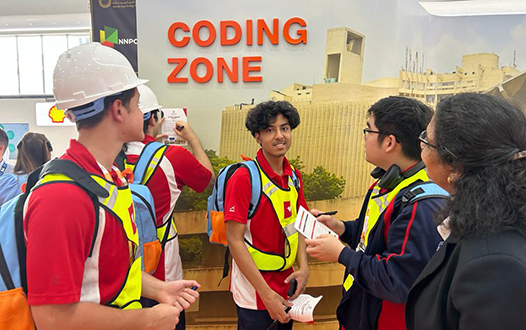 Students engaging at the IIT Delhi - Abu Dhabi coding zone during outreach event